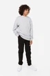 Джоггеры для мальчика черные H&M 158см (400097949) - изображение 4