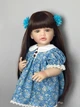 Велика вінілова лялька ручної роботи в сукні Reborn Baby Doll зі справжнім волоссям і красивими очима. - зображення 5