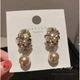 Сережки з перлами та квітами "Gold Secret", 2 кольори, 2х4,6 см - изображение 4