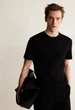 Чоловіча трикотажна футболка Regular Fit H&M (57378) L Чорна - зображення 1