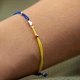 Браслет "Украинское сердце" в красном золоте (синяя и желтая нить) б05322 Онікс - изображение 5