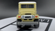 Тематична Машинка Matchbox Toyota Land Cruiser FJ40 Moving Parts 1:64 FWD28/HVN18 Tan - зображення 6