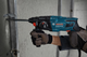 Набір Перфоратор мережевий Bosch Professional GBH 220, 720 Вт, 2дж, 4800 уд.хв, валіза (06112A6020) + Акумуляторна безщіткова кутова шліфувальна машина Bosch Professional GWS 180 + 1 акумуляторна батарея 4 Амп.год GBA 18V, зарядний пристрій GAL 18V-40 - зображення 11