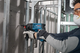 Набір Перфоратор мережевий Bosch Professional GBH 220, 720 Вт, 2дж, 4800 уд.хв, валіза (06112A6020) + Акумуляторна безщіткова кутова шліфувальна машина Bosch Professional GWS 180 + 1 акумуляторна батарея 4 Амп.год GBA 18V, зарядний пристрій GAL 18V-40 - зображення 13