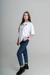 Жіноча oversize футболка з вишивкою на грудях у білому кольорі "Меланія" L-XL - зображення 3