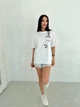 Жіноча футболка з пандою бiлого кольору 28085 42/46 - зображення 1