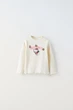 Реглан Hello Kitty Zara 92 см молочний - зображення 1