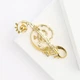 Брошь BROCHE бижутерия Музыка Скрипичный ключ с розой золотистая BRBF114410 - изображение 5