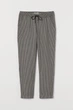 Штани H&M 270750423 32 Бежевий/Чорний - изображение 1