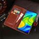 Чохол книжка для Xiaomi Redmi 6 Pro та Mi A2 Lite магніт хлястик прошита Luxury коричневий - зображення 3