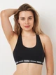 Бюстгальтер без косточек хлопковый Puma Women Racer Back Top 90786204 XS Черный (8718824914237) - изображение 1