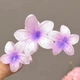Заколка краб для волосся Гавайські квіти 11 см глянсовий Podarkus Пурпуровий BK278-V - зображення 1