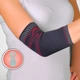 Бандаж на лікоть трикотажний з силіконовими подушечками Orthopoint REF-710 двосторонній налокітник Розмір L - зображення 1