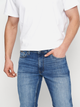 Jeansy slim fit męskie Cross Jeans C 132-073 32-32 Niebieskie (3333333207004) - obraz 4