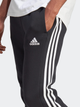 Spodnie dresowe męskie adidas Fleece 3-Stripes Tapered Cuff IB4030 L Czarne (4066762310104) - obraz 4