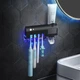 Настінний диспенсер для зубної пасти і стерилізатор для щіток Toothbrush sterilizer WJ3 Black - зображення 1