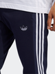 Spodnie dresowe męskie adidas Outline Sp Flc EJ8792 M Ciemnoniebieskie (4061619494129) - obraz 4