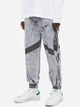 Spodnie dresowe męskie adidas Fb Silk Tp HD2236 M Szare (4065427505053) - obraz 1