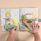 Развивающая мягкая книжка Taf Toys коллекции Садик в городе Бизибук Зайчонка (13355) - изображение 5