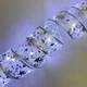 Гибкая светодиодная гирлянда-лента на батарейках LaceShine, 10 м, серебристая, холодный белый свет - изображение 1