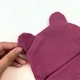 Шапочка для новонародженої однотонна з вушками Magenta 40 - зображення 4