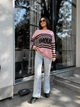 Удлиненный женский свитер с надписью розового цвета 29903 One Size - изображение 1