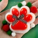 Игрушка антистресс сквиш Лапка новогодняя, 7см, Красно-белый - изображение 1