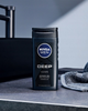 Zestaw kosmetyków do pielęgnacji ciała Nivea Men Deep Collection Krem uniwersalny 75 ml + Antyperspirant roll-on 50 ml + Żel pod prysznic 250 ml + Woda po goleniu 100 ml (9005800383057) - obraz 3