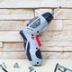 Викрутка з розкладною ручкою на аккумуляторі 4.8V електровикрутка-шуруповерт у валізі з насадками RD00-35, Сірий - зображення 12
