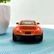 Машинка Auto Expert Nissan GTR металева 1:32 світло/звук/інерційна Помаранчева (38071) - зображення 9