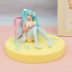 Фігурка Хацуне Міку сидить на ліжку з чашкою 12 см Hatsune Miku - зображення 2
