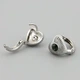 Серьги с кристаллами Swarovski Сердце 49197 размер 13х12 мм цвет зеленый вес 3.4 г позолота Белое Золото - изображение 2