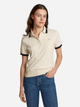 Поло жіноче Tommy Hilfiger WW0WW43925-AEF S Молочне (8720638414773) - зображення 1
