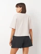 Футболка хлопковая оверсайз короткая женская Adidas W Bl Sj Bf T JG8729 L Wonalu/White (4067902913032) - изображение 2
