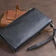 Кошелек-клатч ST Leather из натуральной кожи черный вертикальный на молнии с карманом для телефона 56429 - изображение 7