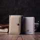 Женский кожаный кошелек ST Leather разноцветный вертикальный тройного сложения с монетницей 55543 - изображение 8