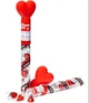 Шоколадні цукерки Hershey's Kisses Heart Cane Milk Chocolate Tubes 63.5г - зображення 3
