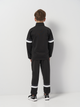 Подростковый спортивный костюм (толстовка + штаны) для мальчика Puma TeamRISE Tracksuit Jr 65865503 170-176 см Puma Black-Puma Black (4067978012714) - изображение 2