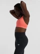 Спортивный топ для фитнеса женский New Balance Essential Train Bra WB51035DTR L Ярко-розовый (197967334108) - изображение 4