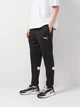 Спортивные штаны для футбола мужские Puma Individualrise Pant 65947603 XL Black-White (4067978201248) - изображение 1