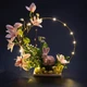 Великодня композиція GALA DECOR з штучних рожевих квітів та яєць з кроликом в ободі з підсвіткою КП30РК - зображення 1