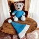 М'яка плюшева іграшка handmade Ведмедик 34 см бежево-біло-синій у ковпаку в'язаний гачком амігурумі - зображення 4