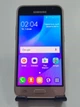Мобільний телефон Samsung Galaxy J1 2016 1/8GB Gold (SM-J120H) (б/в) - зображення 1