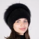 Женская меховая норковая шапка на вязаной основе с помпоном из меха песца Меховой Стиль Улитка 54-60 Темный ирис (131/J) - изображение 1