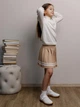 Детская трикотажная школьная юбка для девочки ARTKNIT Смужка 128-134 см Бежевая (4823093471733) - изображение 4