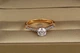 Кільце Xuping Jewelry з родієм камінь 6 мм з боків дрібні камені р 17золотистое - зображення 1