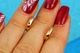 Сережки Xuping Jewelry кільця з малюнком крокрененеві діагональні смужки 1 см золотисті - зображення 1