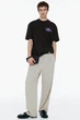 Футболка с принтом H&M Loose Fit L темно-коричневий 1034065133 - зображення 1