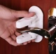 Дитячі обмежувачі 2 шт замок-блокатор на віконні та дверні ручки Door Lever Lock - зображення 4