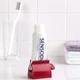 Дозатор выжималка для выдавливания зубной пасты и крема Toothpaste tube Squeezer (красный) - изображение 3